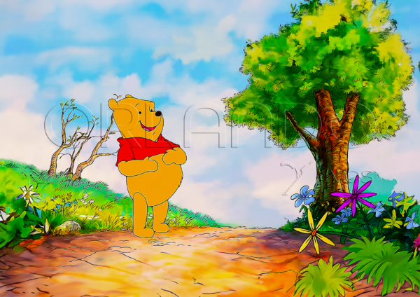 Winnie the Pooh enjoys the beautiful flowers in the beginning of spring