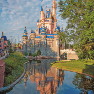 Cinderella Castle silhouette takes on a magical glow from a side view at Magic Kingdom